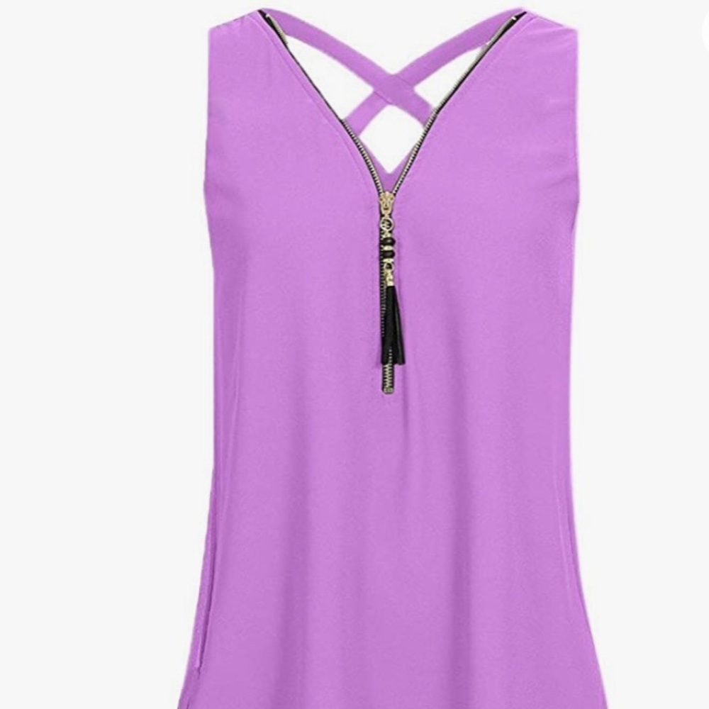 Purple tank top. BRAND NEW.  NEVER WORN. Size small.  Crisscross back.